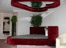 Suite, 1 King Bed, Jetted Tub | Individually decorated, individually furnished, iron/ironing board
