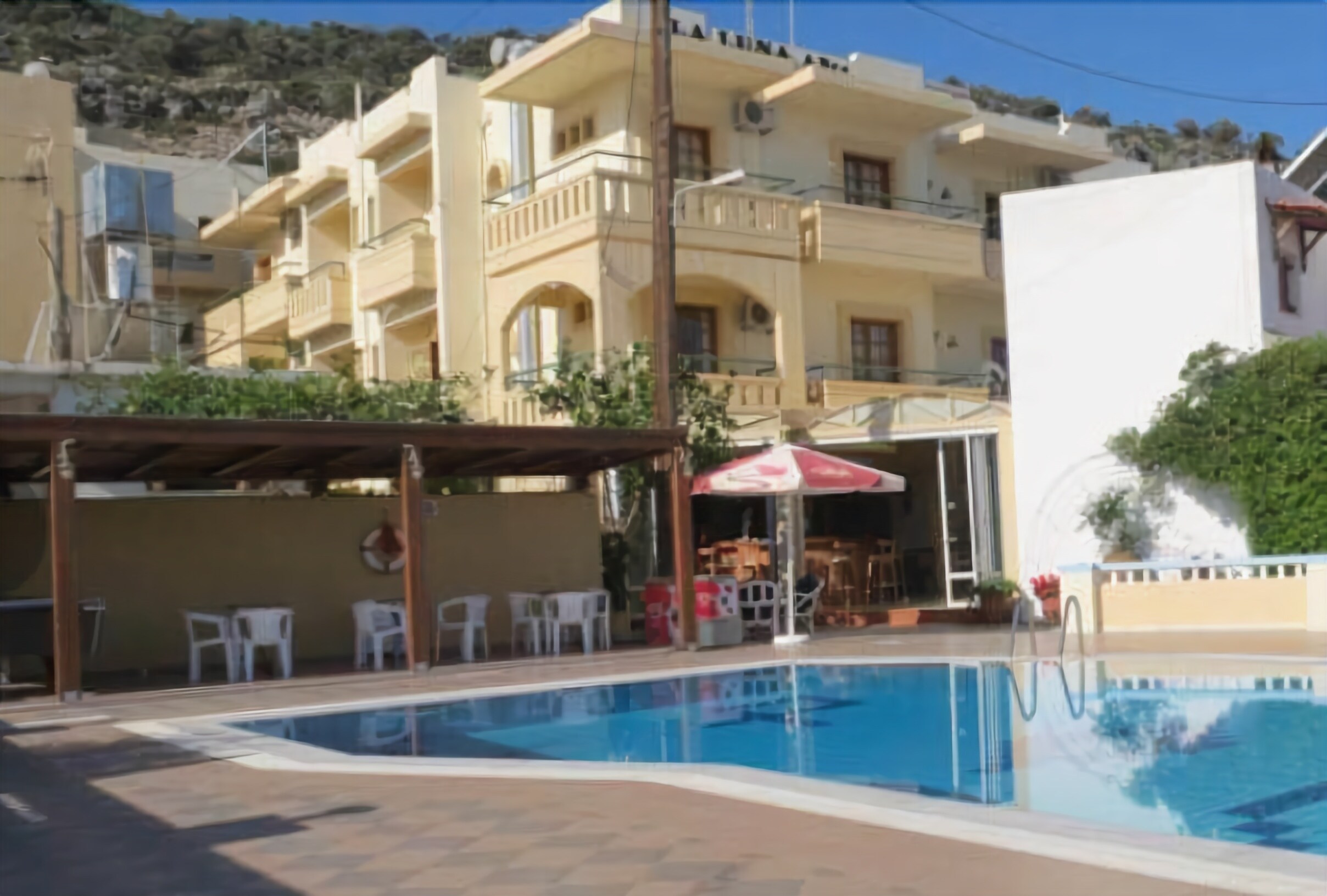 Seasonal outdoor pool, pool umbrellas, sun loungers