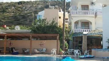 Seasonal outdoor pool, pool umbrellas, sun loungers