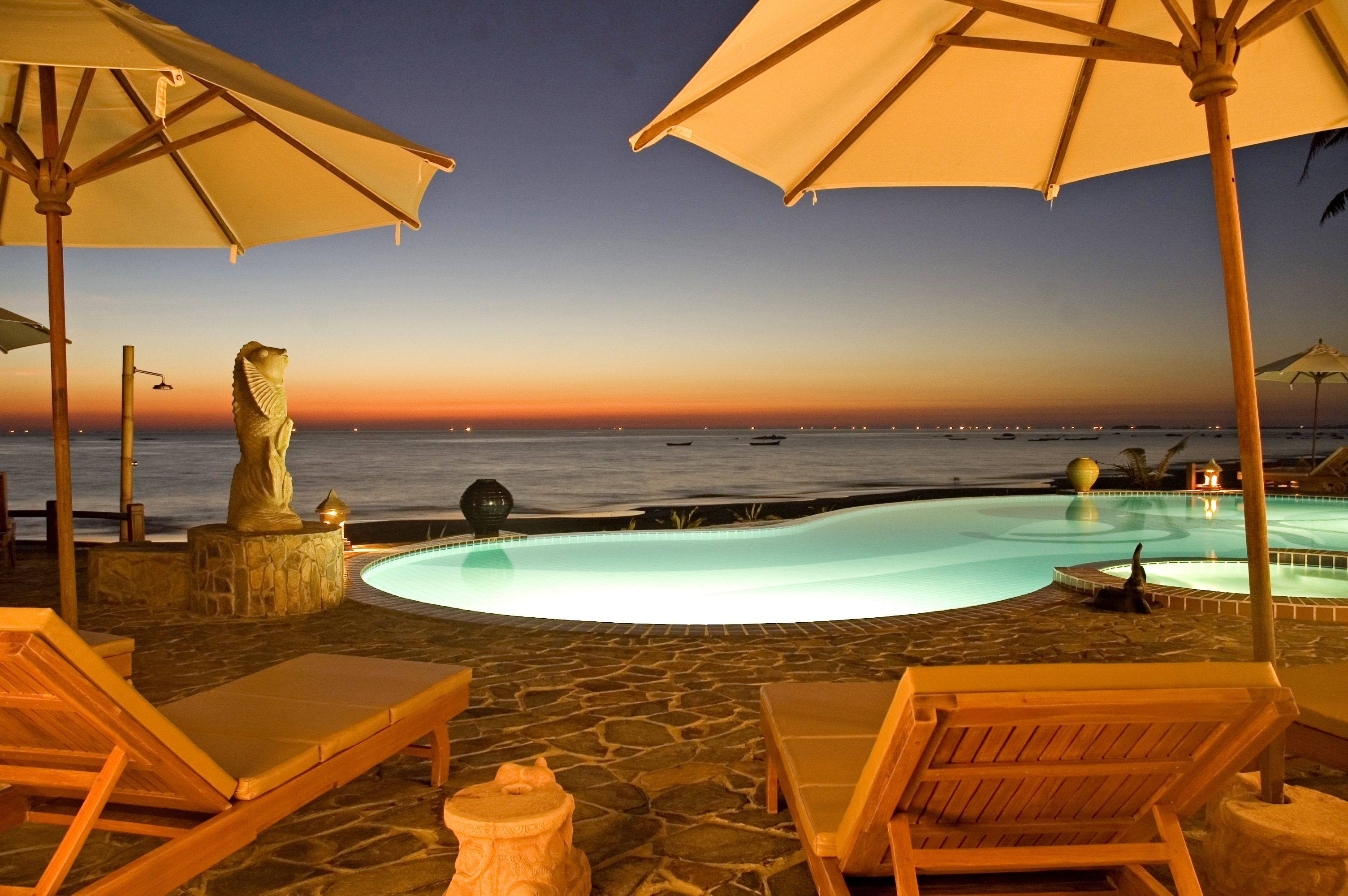 outdoor pool, pool umbrellas, pool loungers