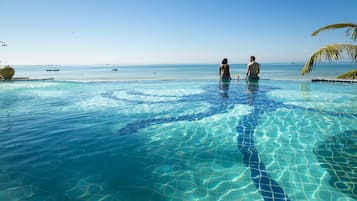 Outdoor pool, pool umbrellas, sun loungers