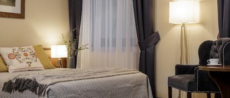 Premium bedding, down duvets, in-room safe, desk