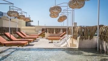 Outdoor pool, pool umbrellas, pool loungers