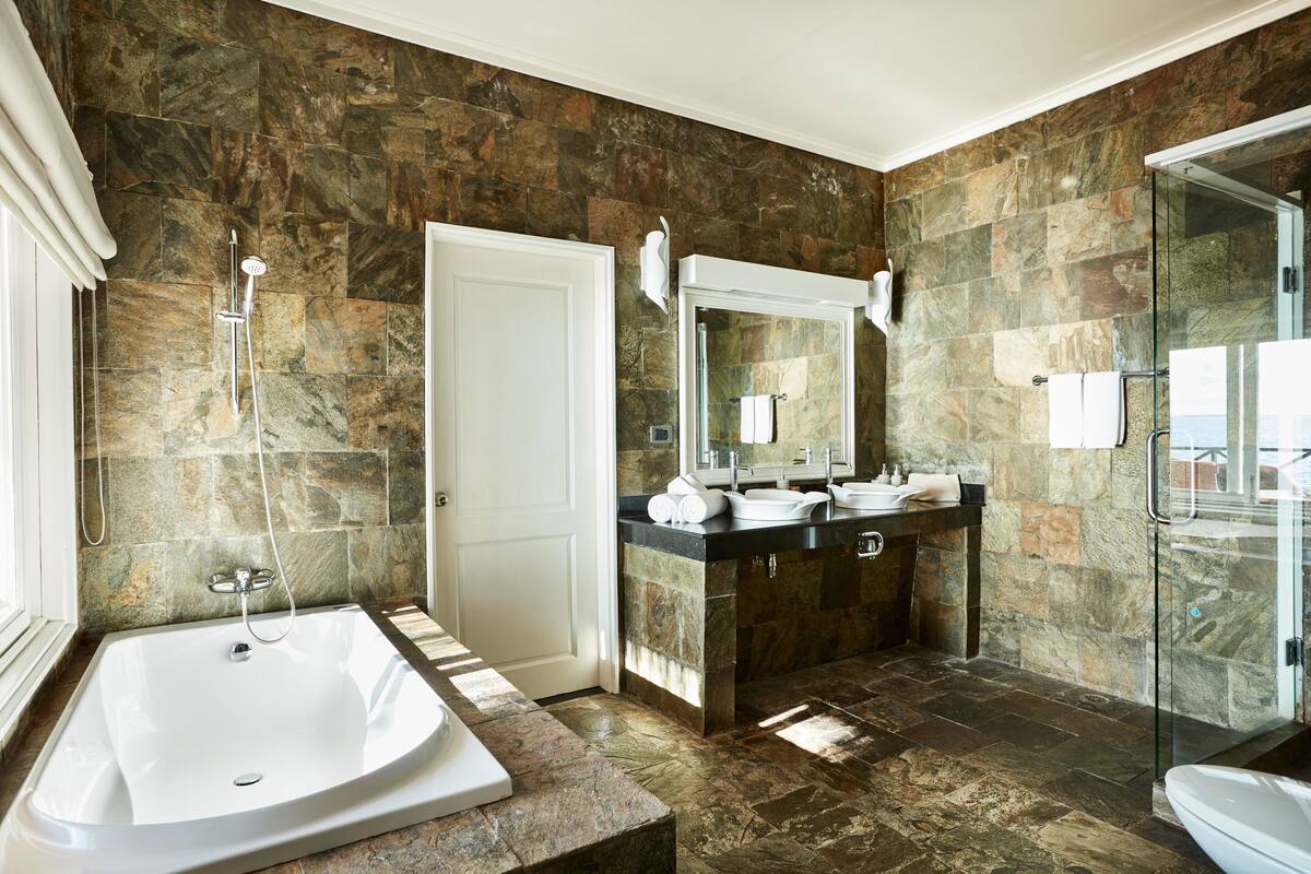 separate bathtub and shower, free toiletries, hair dryer, bathrobes