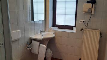 Shower, free toiletries, hair dryer, slippers