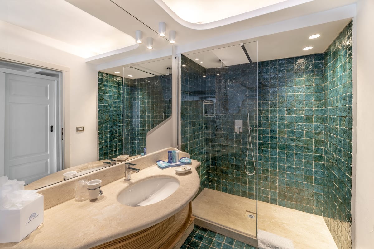 superior room | bathroom | shower, free toiletries, hair dryer, bidet