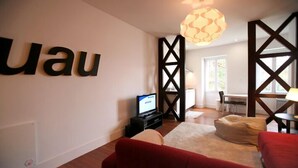 Superior Studio | Living area | Flat-screen TV