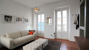 Superior Studio | Living area | Flat-screen TV