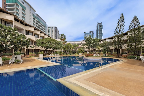 2 outdoor pools, open 7:00 AM to 7:00 PM, pool loungers