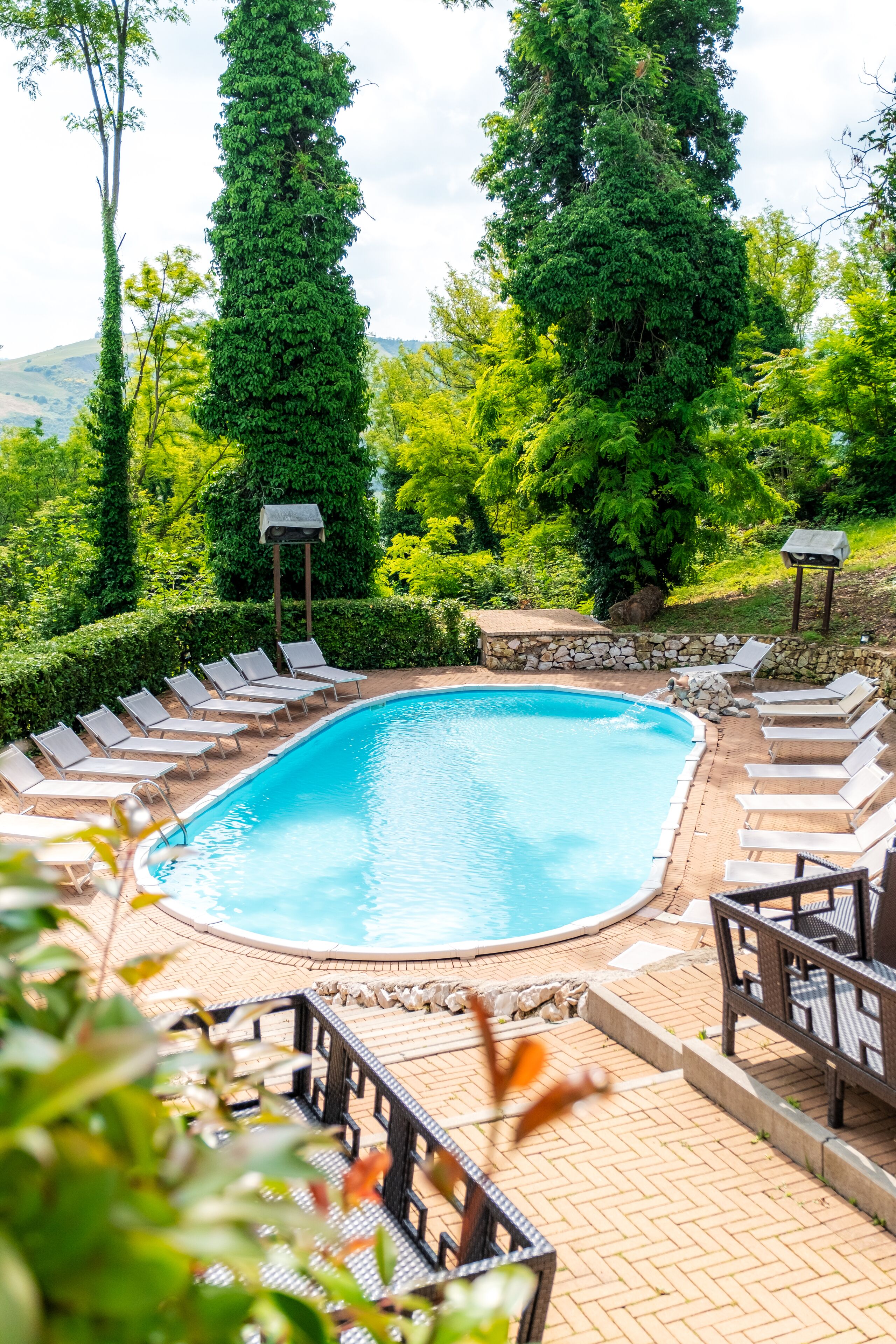 Seasonal outdoor pool, open 10:30 AM to 6:30 PM, pool umbrellas