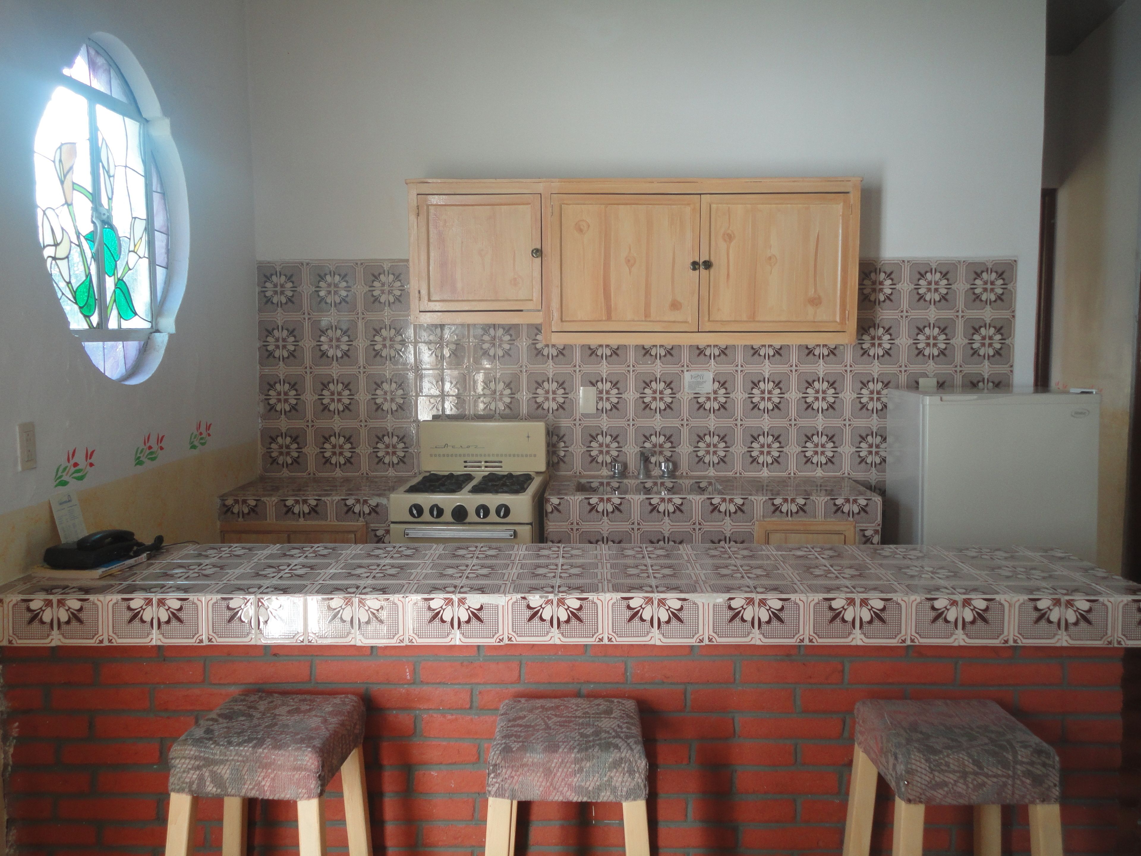 fridge, stovetop, cookware/dishes/utensils