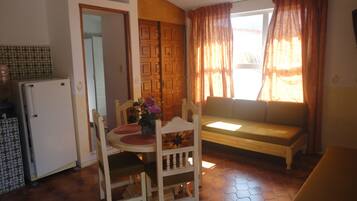 Double Room | Living area | 21-inch TV with cable channels