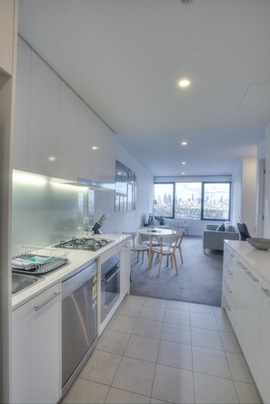 Two Bedroom Apartment - City View | Private kitchen | Coffee/tea maker, full-size fridge, microwave, oven - Alt Tower (TRAVANCORE)