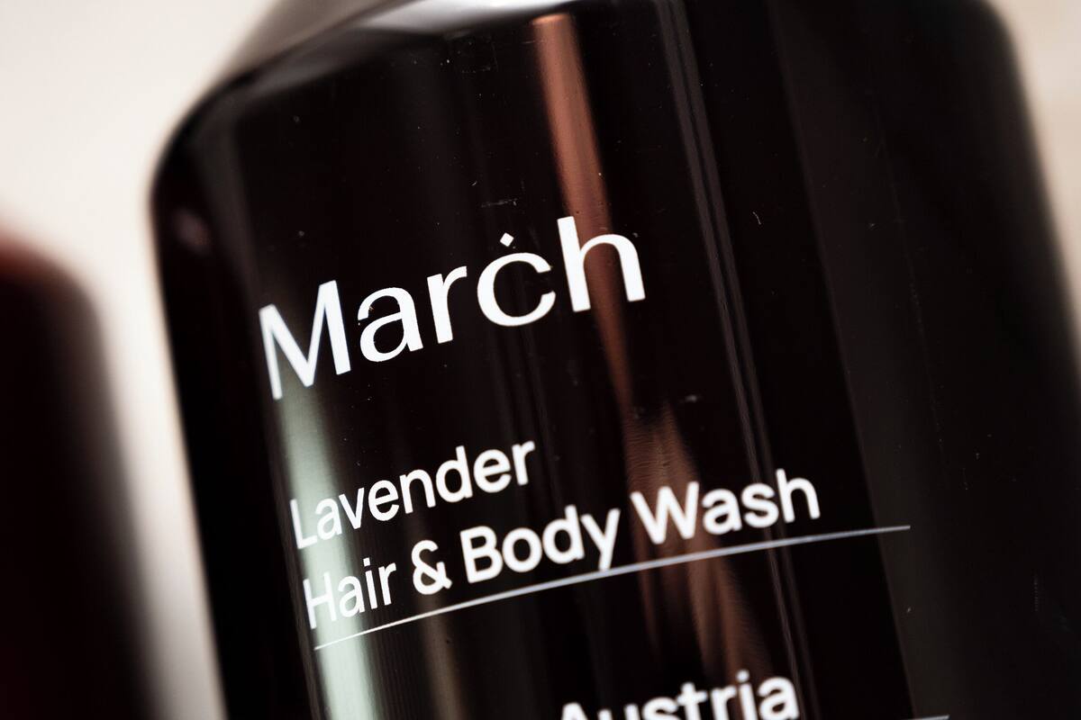 designer toiletries, hair dryer, bathrobes, slippers