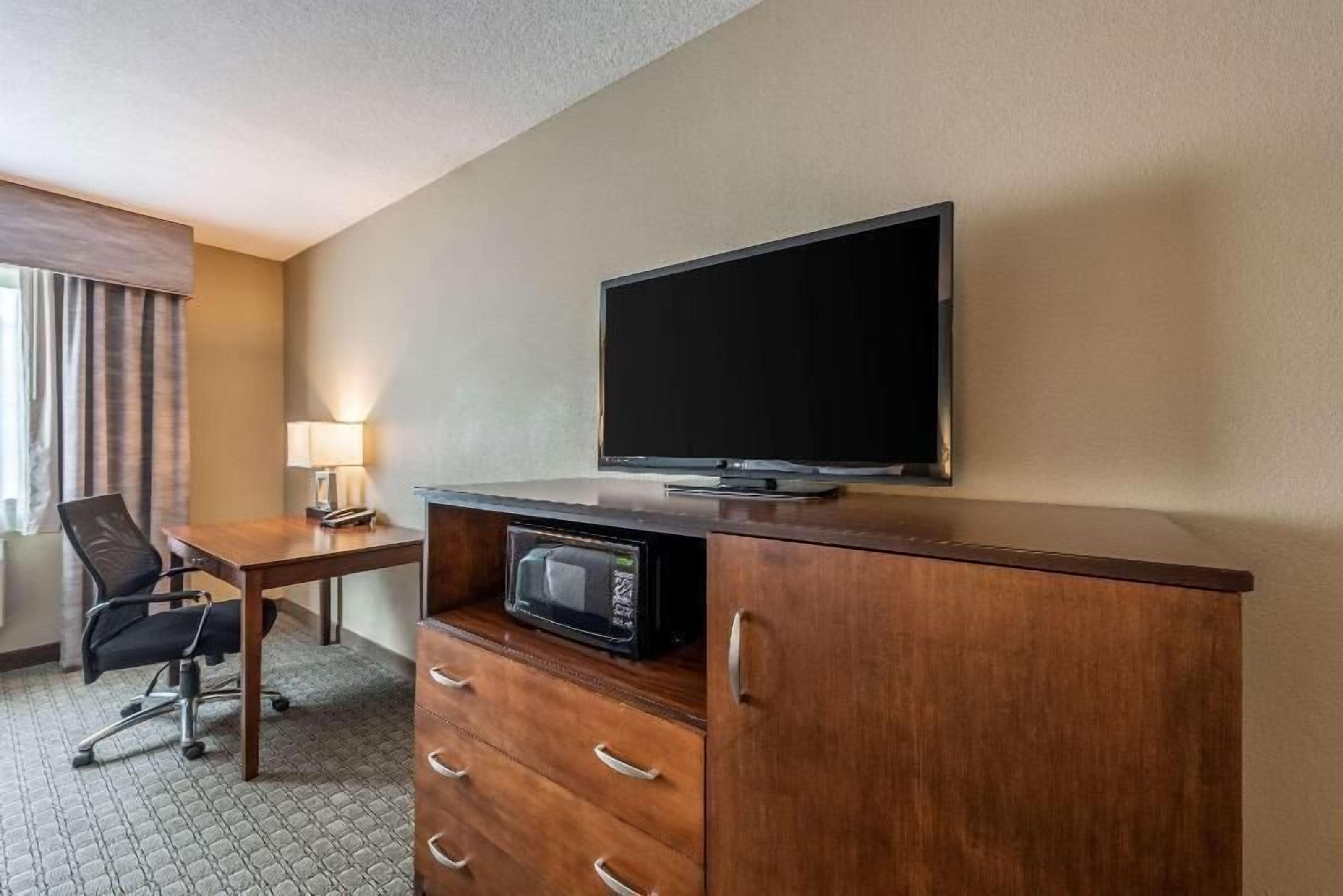 desk, blackout curtains, soundproofing, iron/ironing board