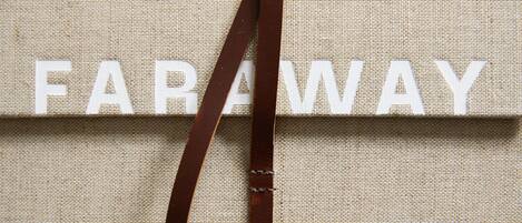 A fabric with the word "FARAWAY" printed on it.
