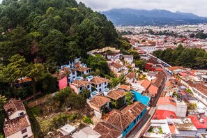 Experience the charm of this vibrant town, nestled in a lush valley surrounded by green hills.