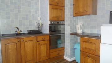 1 chambre, fer et planche Ă repasser, Wi-Fi gratuit, draps fournis