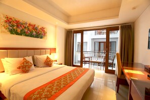 Deluxe Room, Balcony | In-room safe, iron/ironing board, rollaway beds, free WiFi - The Sun Hotel & Spa Legian, Bali (Legian)