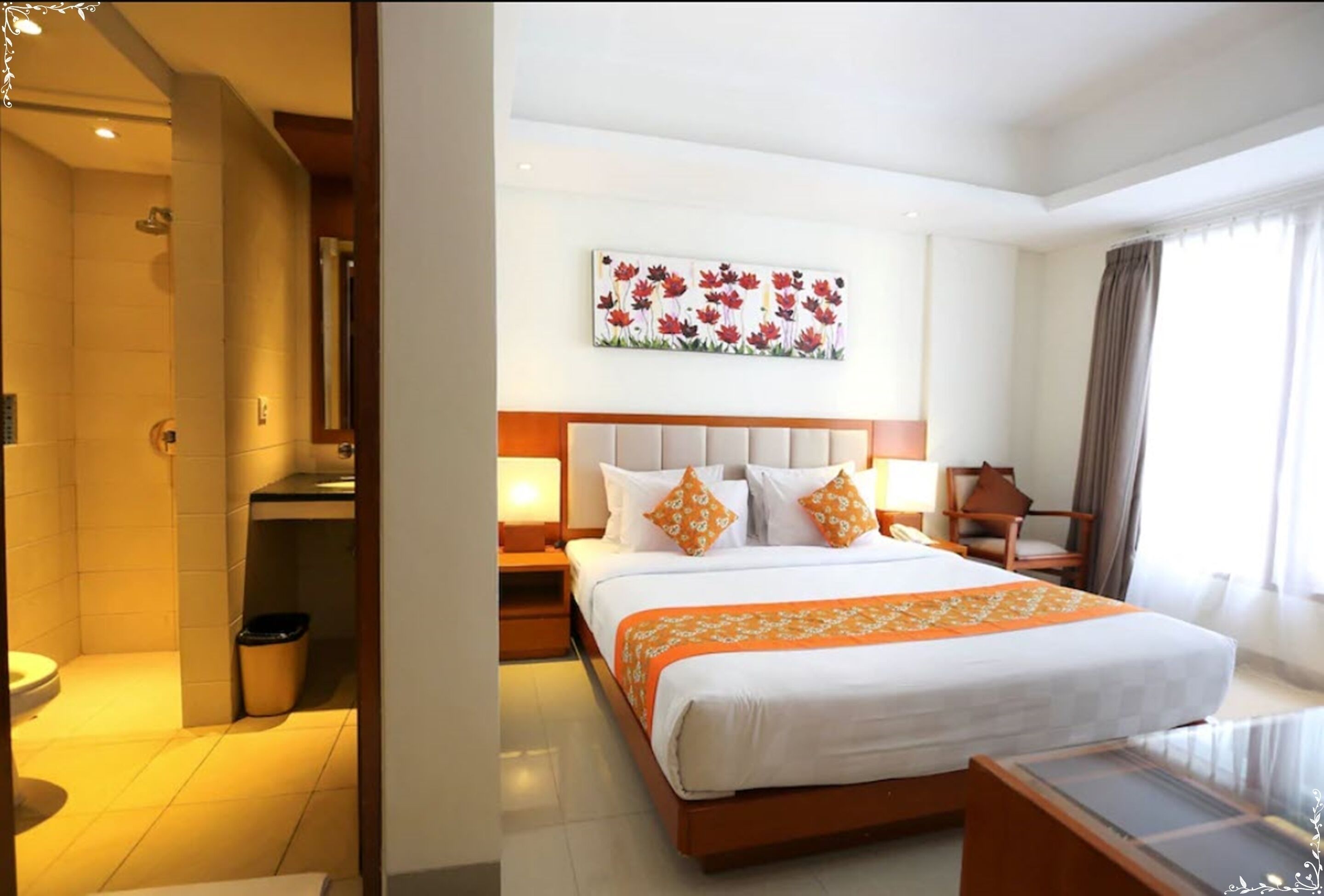 A hotel room with a large bed, a nightstand, a bedside table, a shower area, and a bathroom.