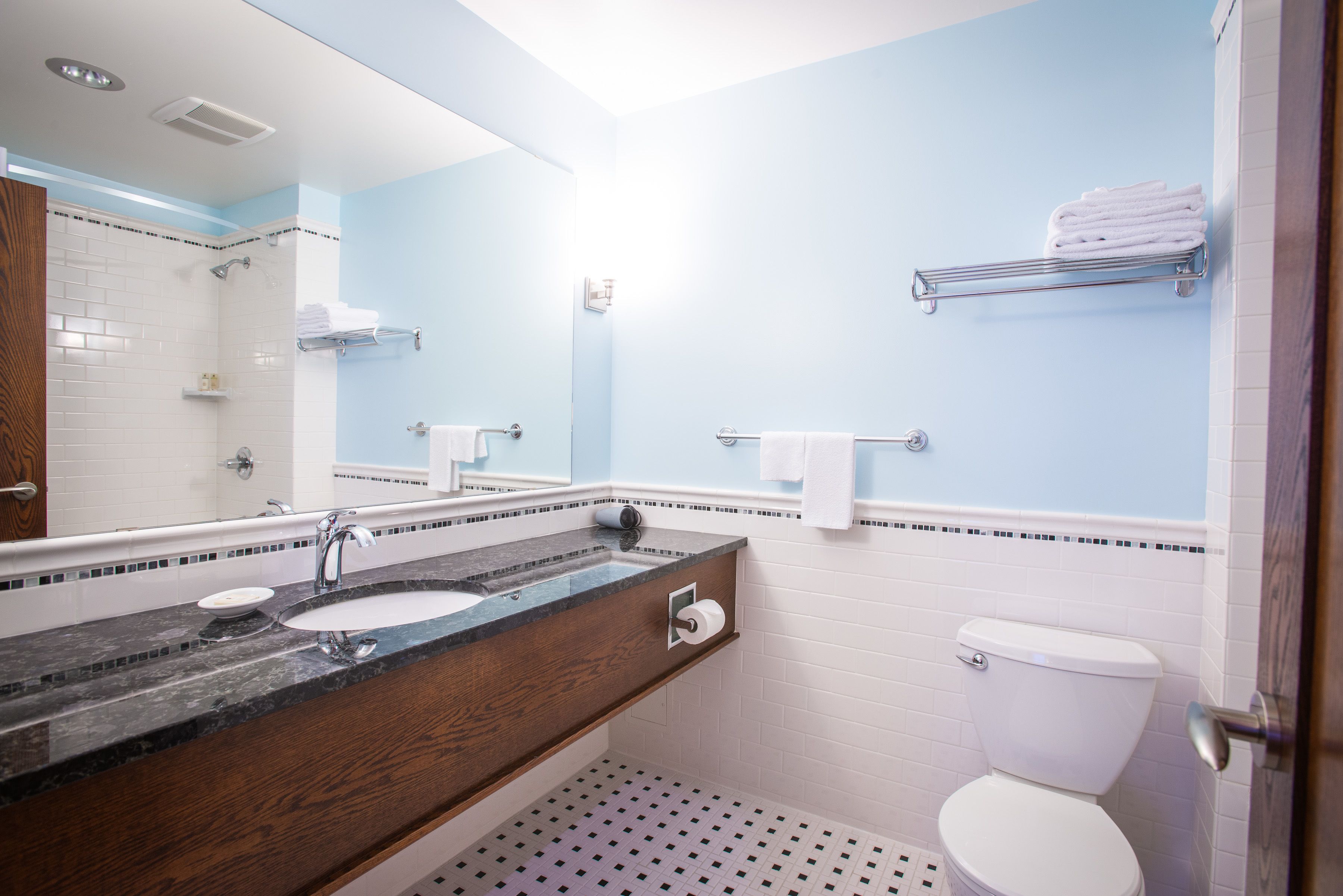 shower, designer toiletries, hair dryer, towels