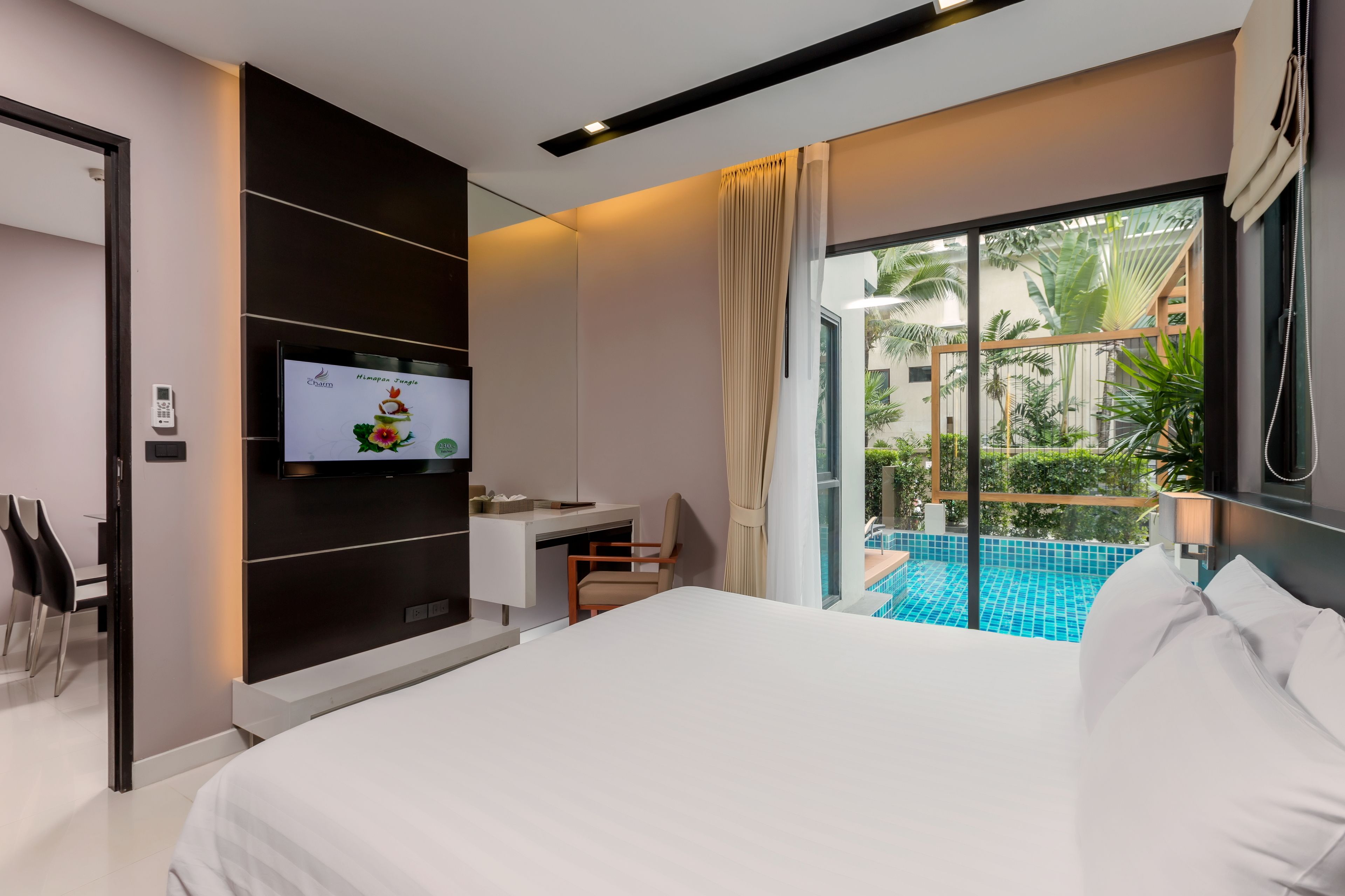 junior suite, pool access | 1 bedroom, in-room safe, desk, blackout curtains