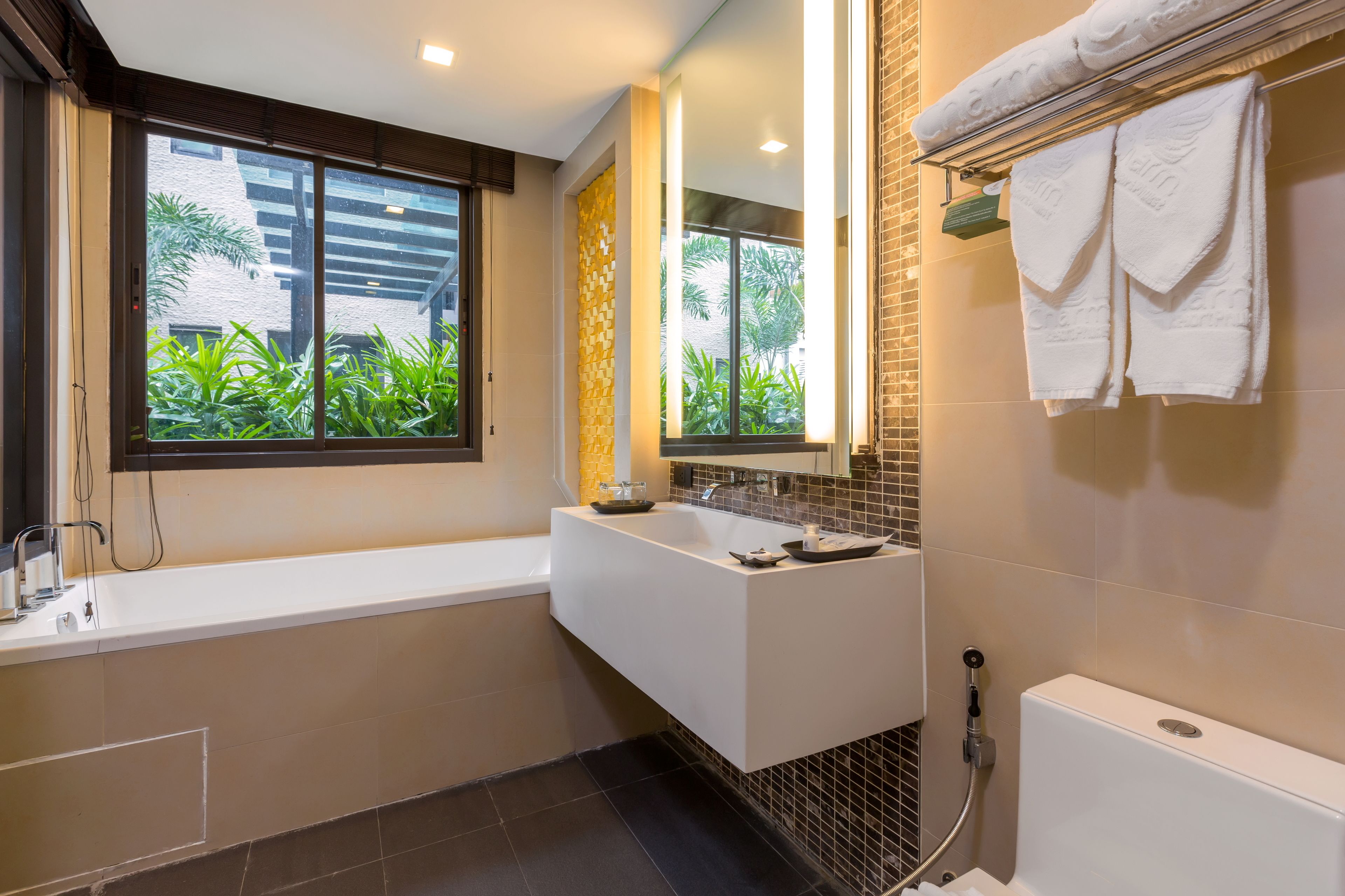 junior suite | bathroom amenities | rainfall showerhead, free toiletries, hair dryer, bathrobes