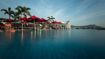 Outdoor pool, open 7 AM to 8:00 PM, free pool cabanas, pool umbrellas