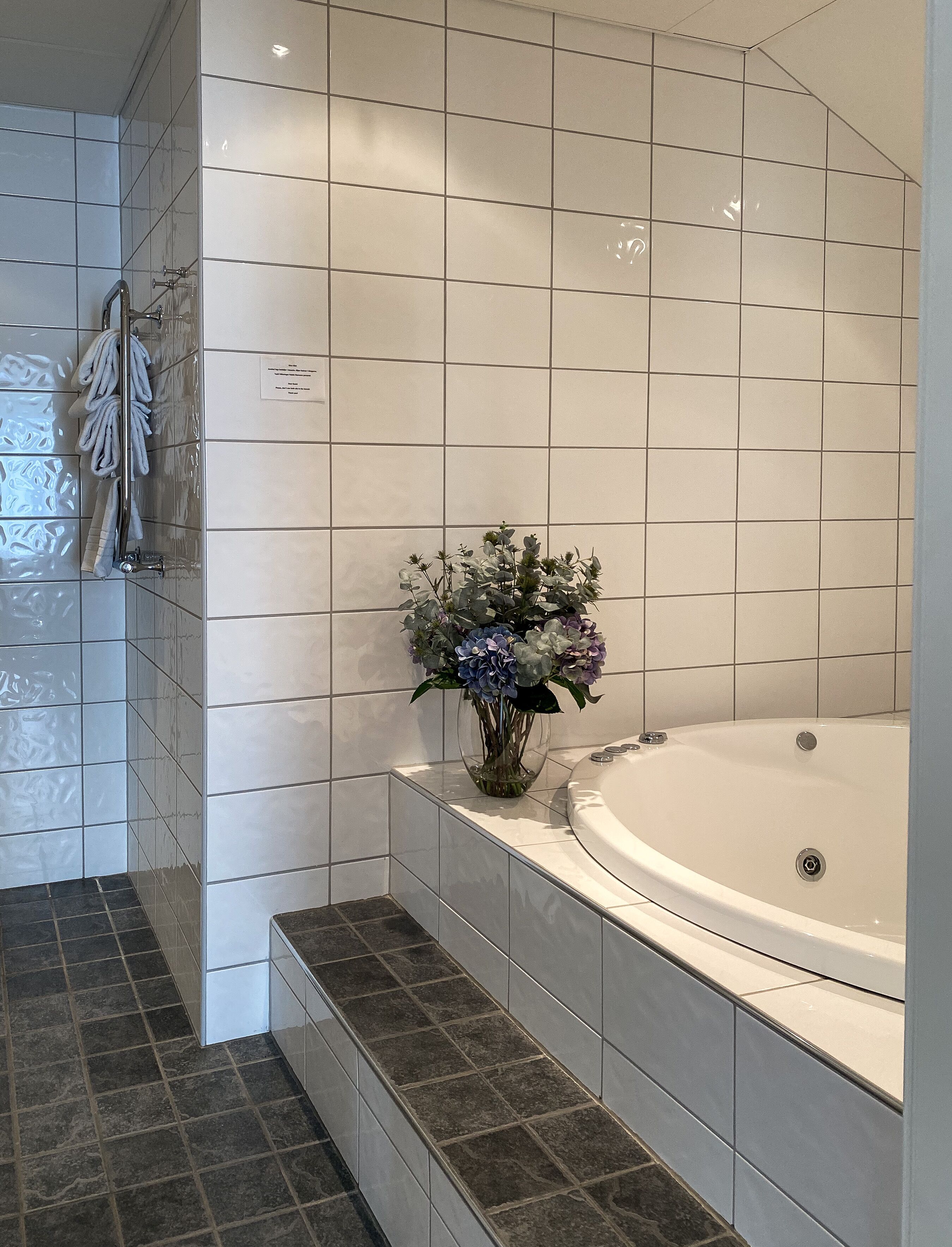 superior suite (pool access included) | bathroom | shower, hair dryer, towels, soap