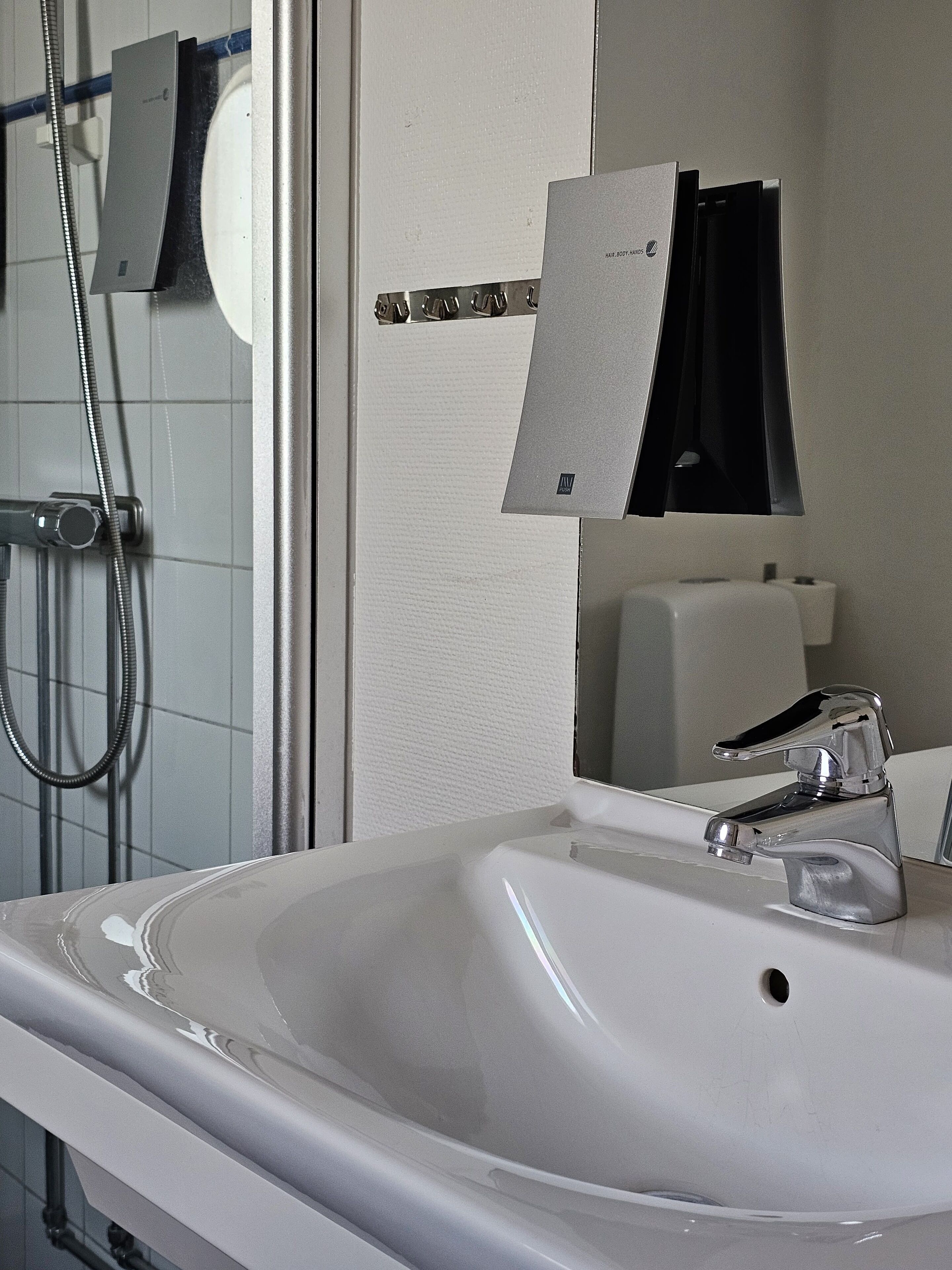 basic double room | bathroom | shower, hair dryer, towels, soap