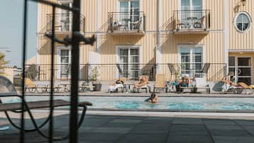 Indoor pool, outdoor pool, open 8:00 AM to 8:00 PM, pool loungers