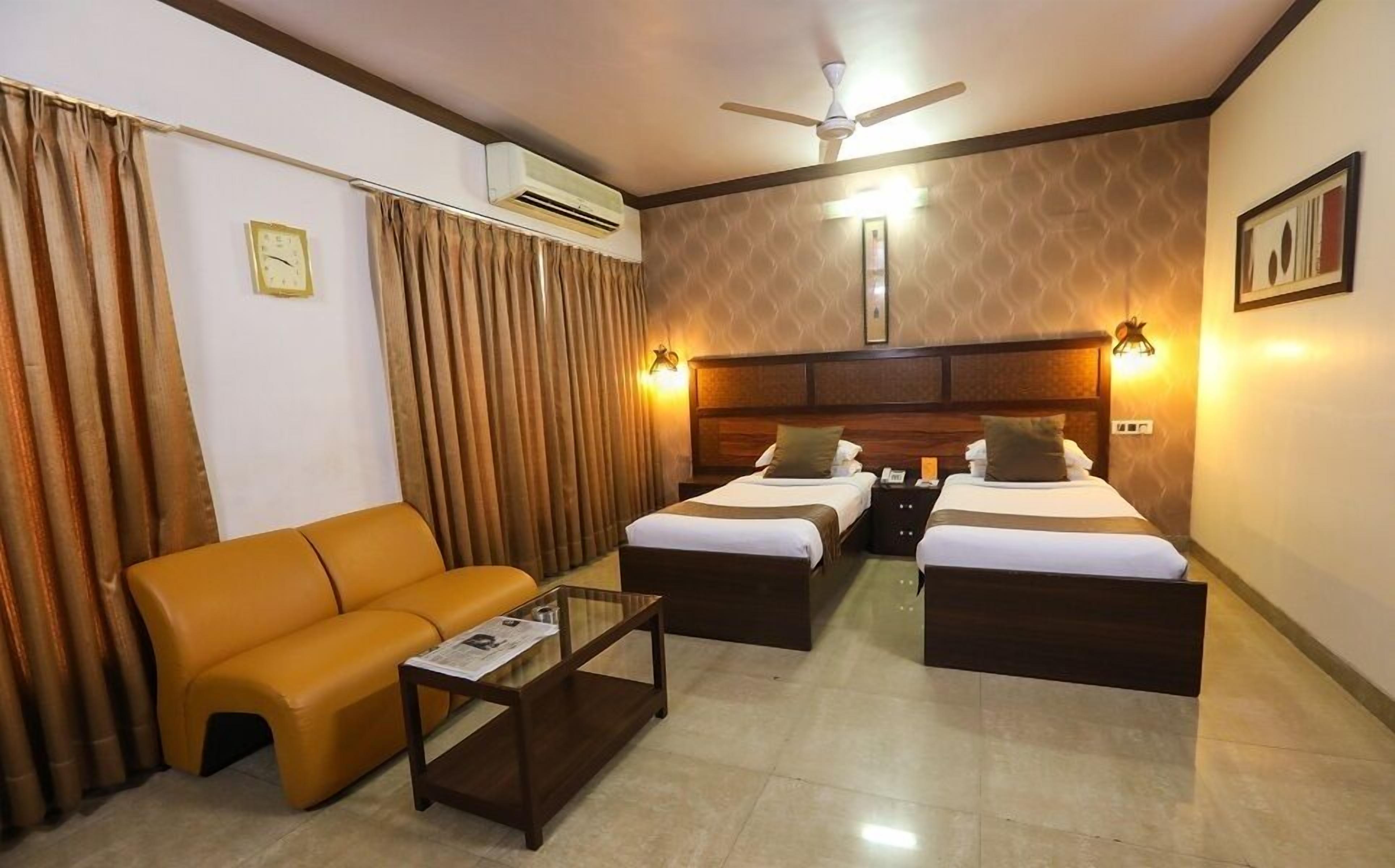 deluxe room | in-room safe, desk, blackout curtains, iron/ironing board
