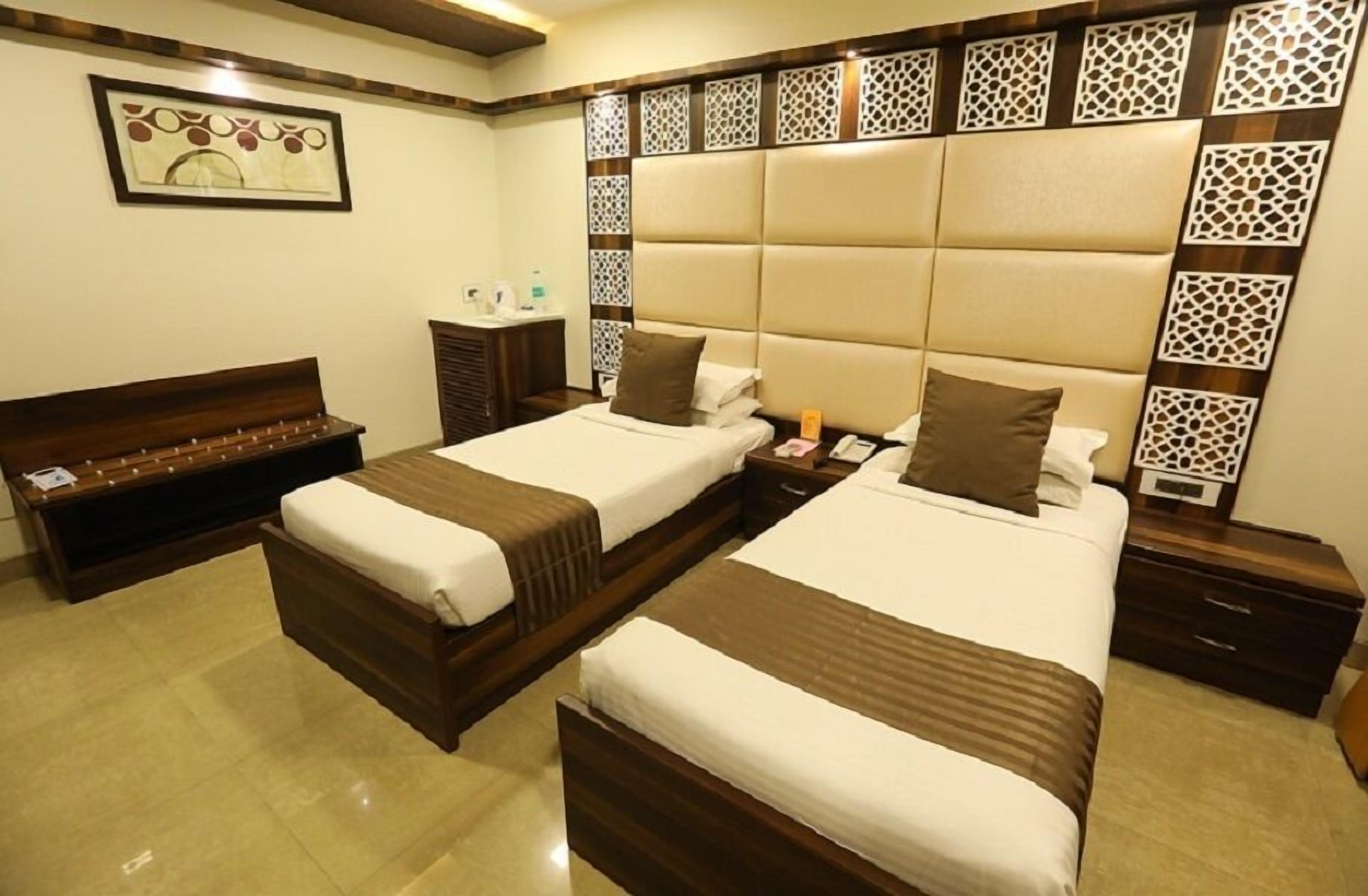 executive room | in-room safe, desk, blackout curtains, iron/ironing board