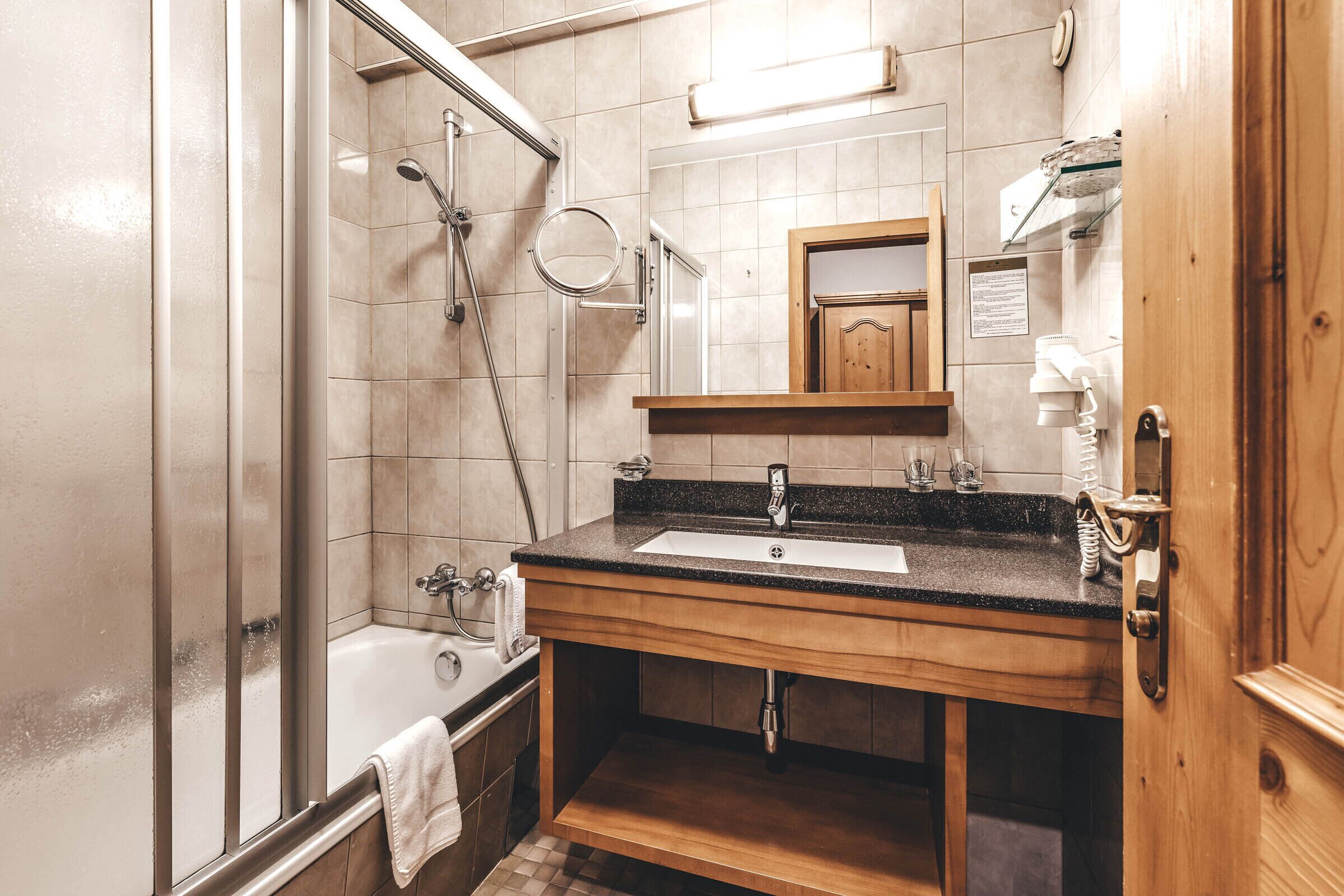 comfort double room, balcony, mountain view | bathroom | free toiletries, hair dryer, bathrobes, towels