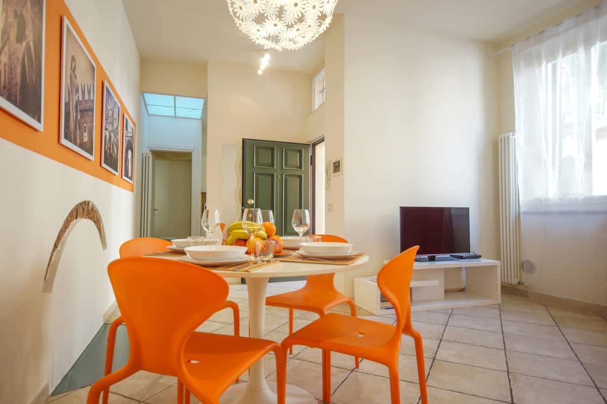 Apartment, 1 Bedroom (Residenza Guarienti - Via Dietro Pallone 12) | Living area | 25-inch flat-screen TV with digital channels, LCD TV