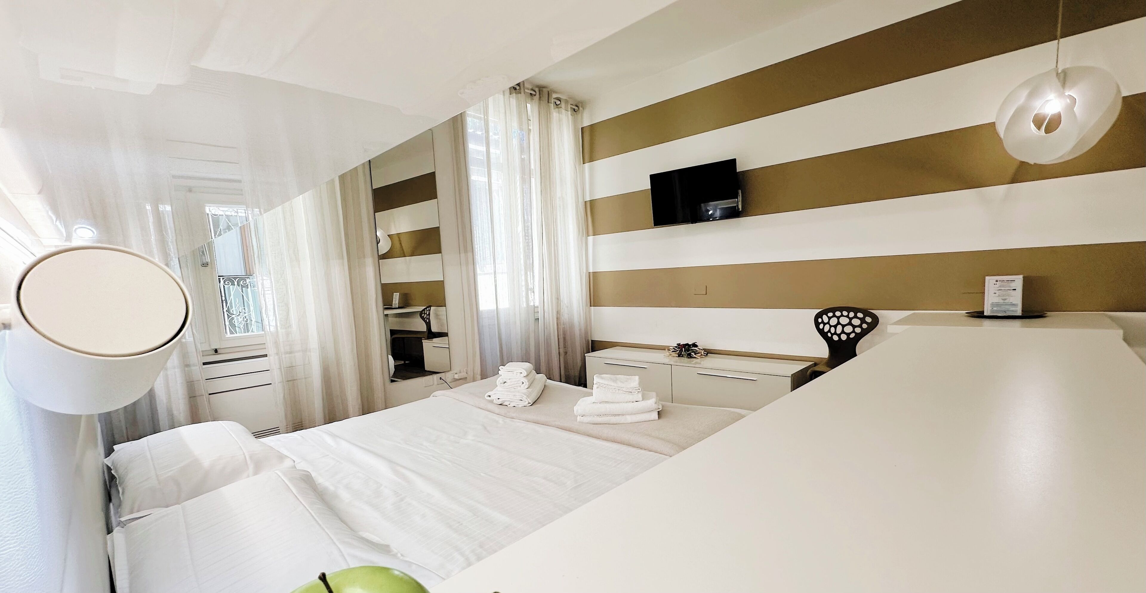 Superior Studio (Residenza Rensi - Vicolo Rensi 6) | Down comforters, individually furnished, laptop workspace