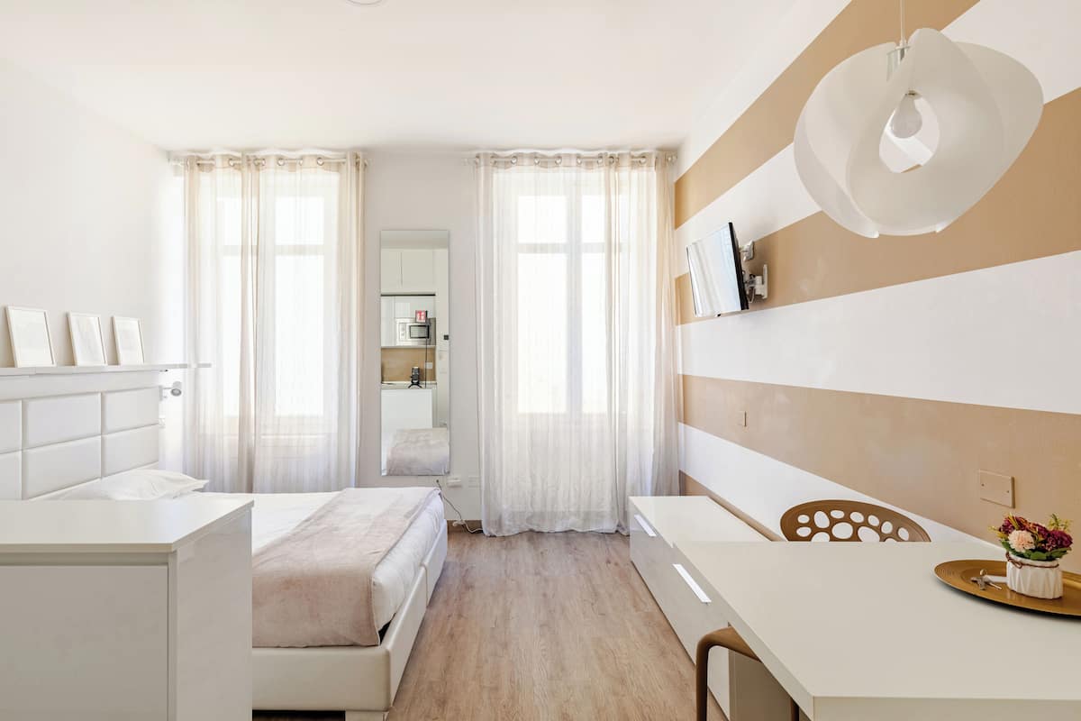 Estudio superior (Residenza Rensi - Vicolo Rensi 6) | Zona de estar | Televisión de pantalla plana de 25 pulgadas con canales digitales