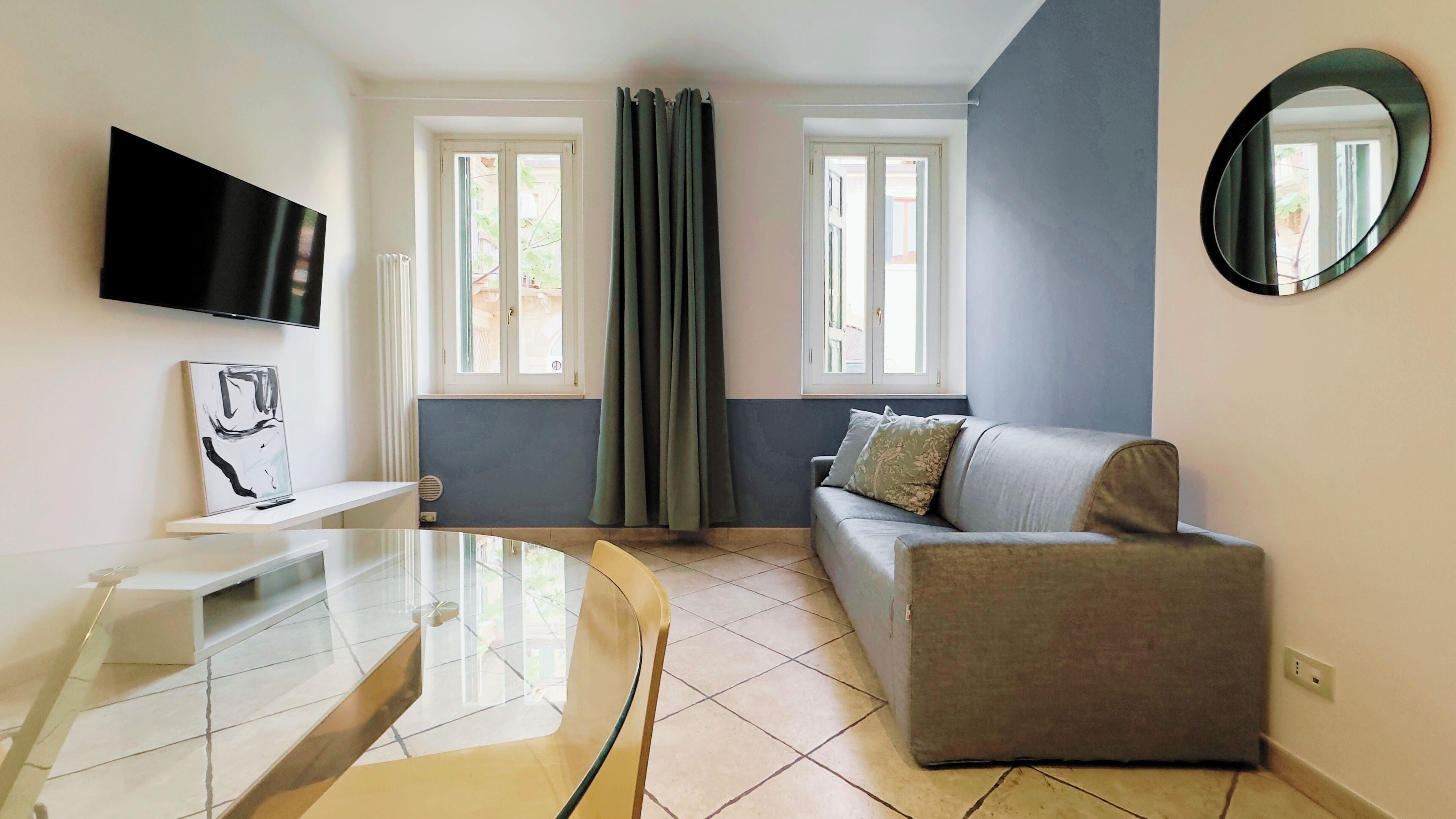 アパートメント 1 ベッドルーム (Residenza Guarienti-Via D.Pallone 12) | リビング エリア | 25 インチの薄型テレビ (デジタル放送視聴可)、液晶テレビ