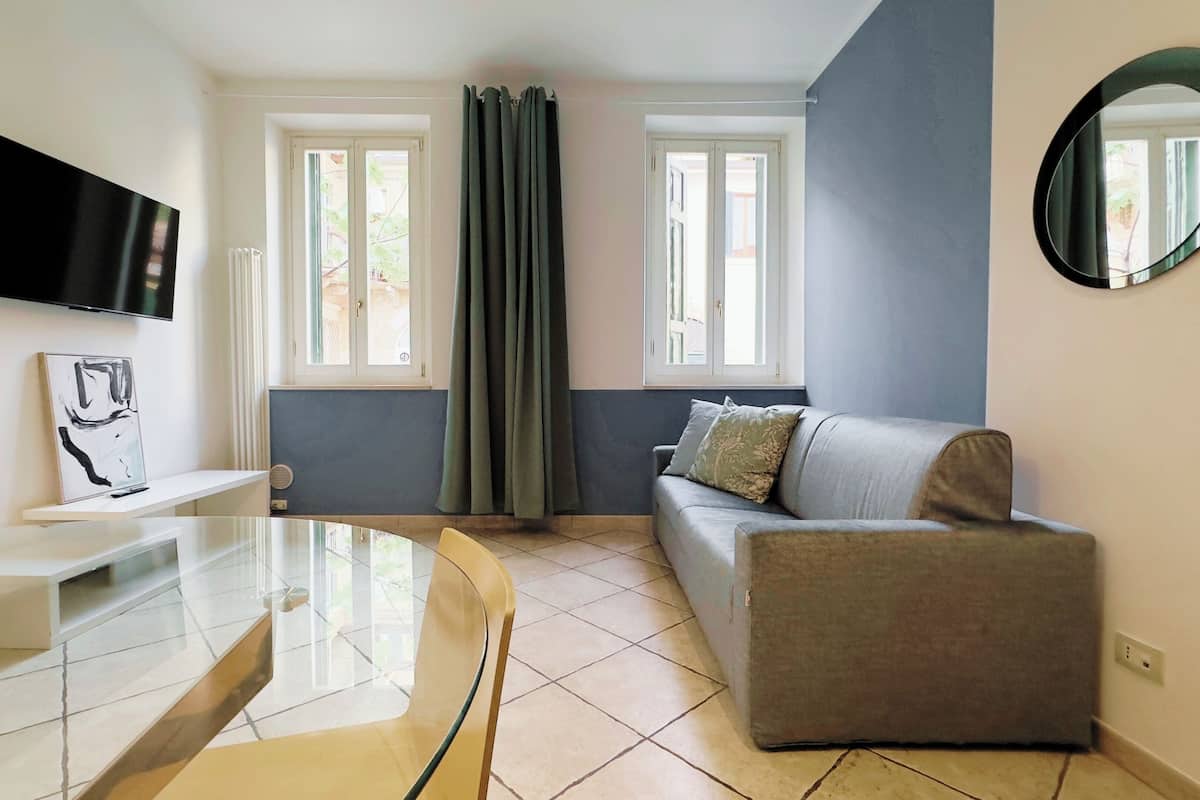 Apartamento, 1 habitación (Residenza Guarienti-Via D.Pallone 12) | Zona de estar | Televisión de pantalla plana de 25 pulgadas con canales digitales