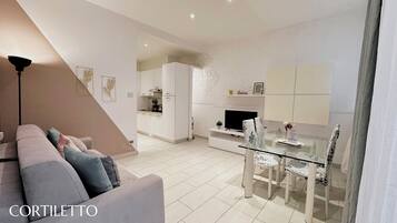 Cortiletto 1/2 - vicolo Torcoletto 3B/5 | Living area | 25-inch flat-screen TV with digital channels, LCD TV