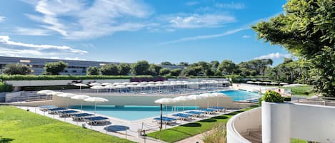 Seasonal outdoor pool, pool umbrellas, pool loungers