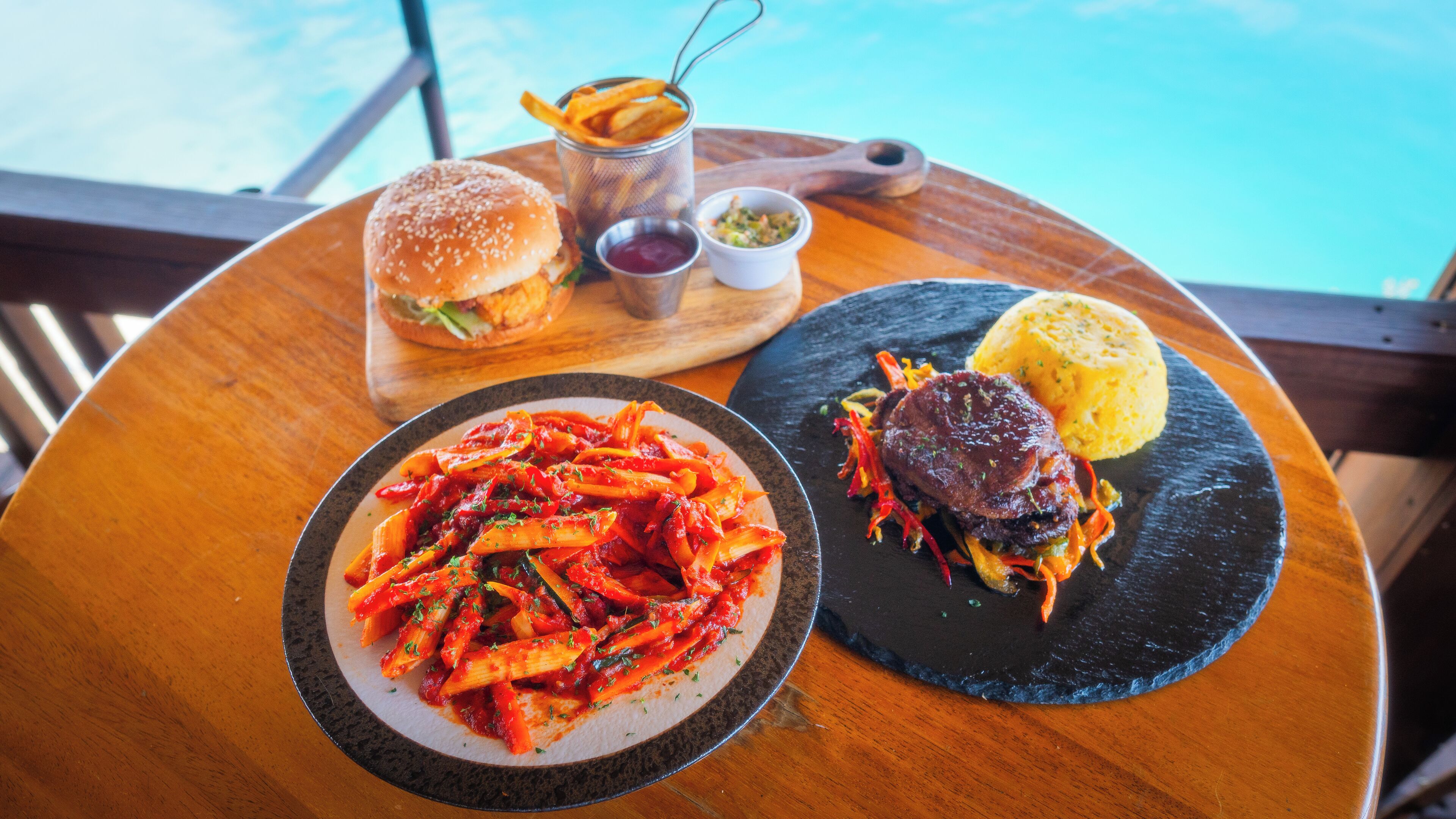 breakfast, lunch, dinner served; beach views