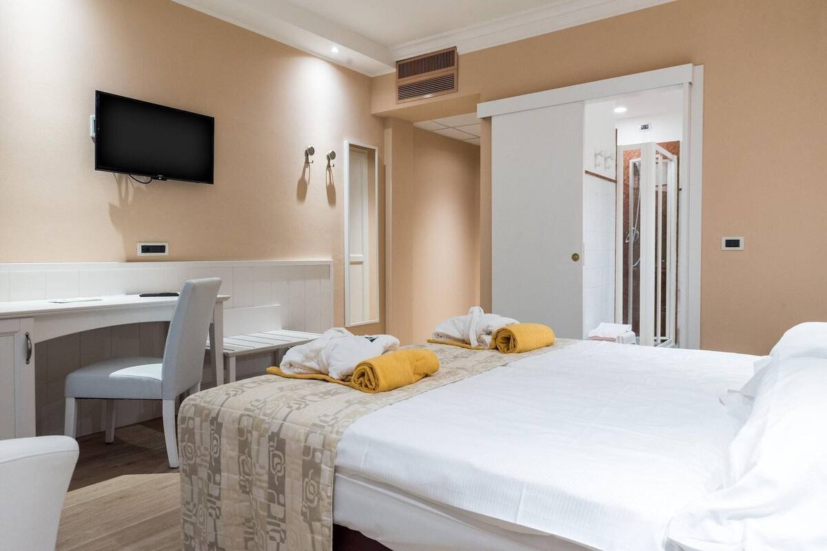 Down comforters, memory foam beds, minibar, in-room safe