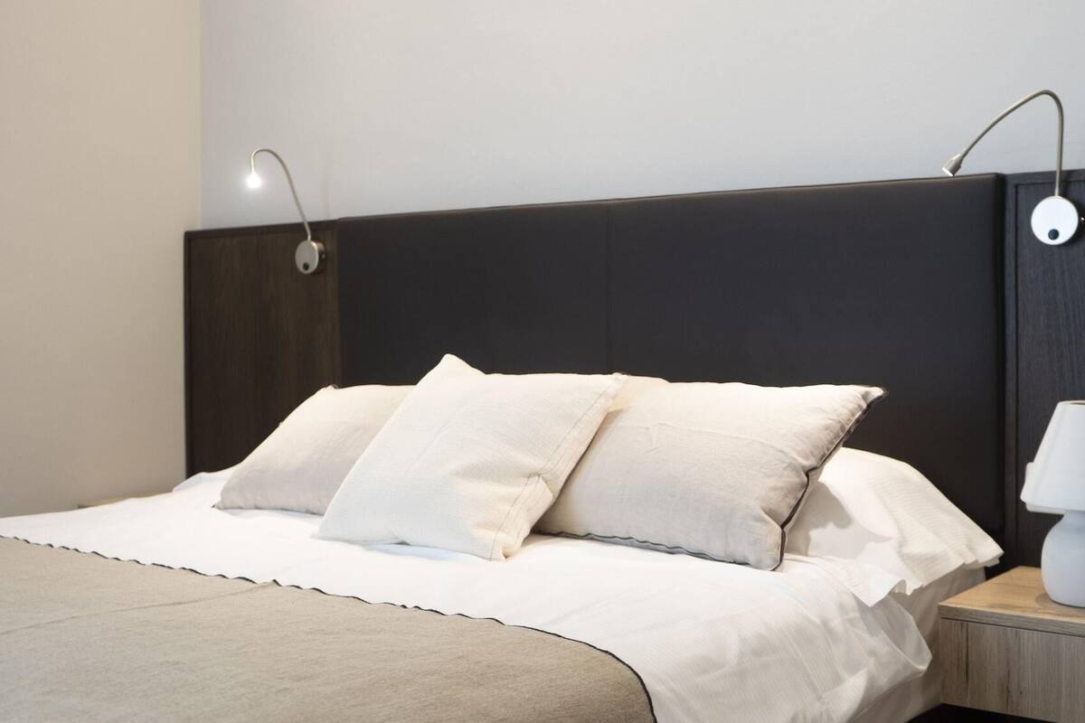 Down comforters, memory foam beds, minibar, in-room safe