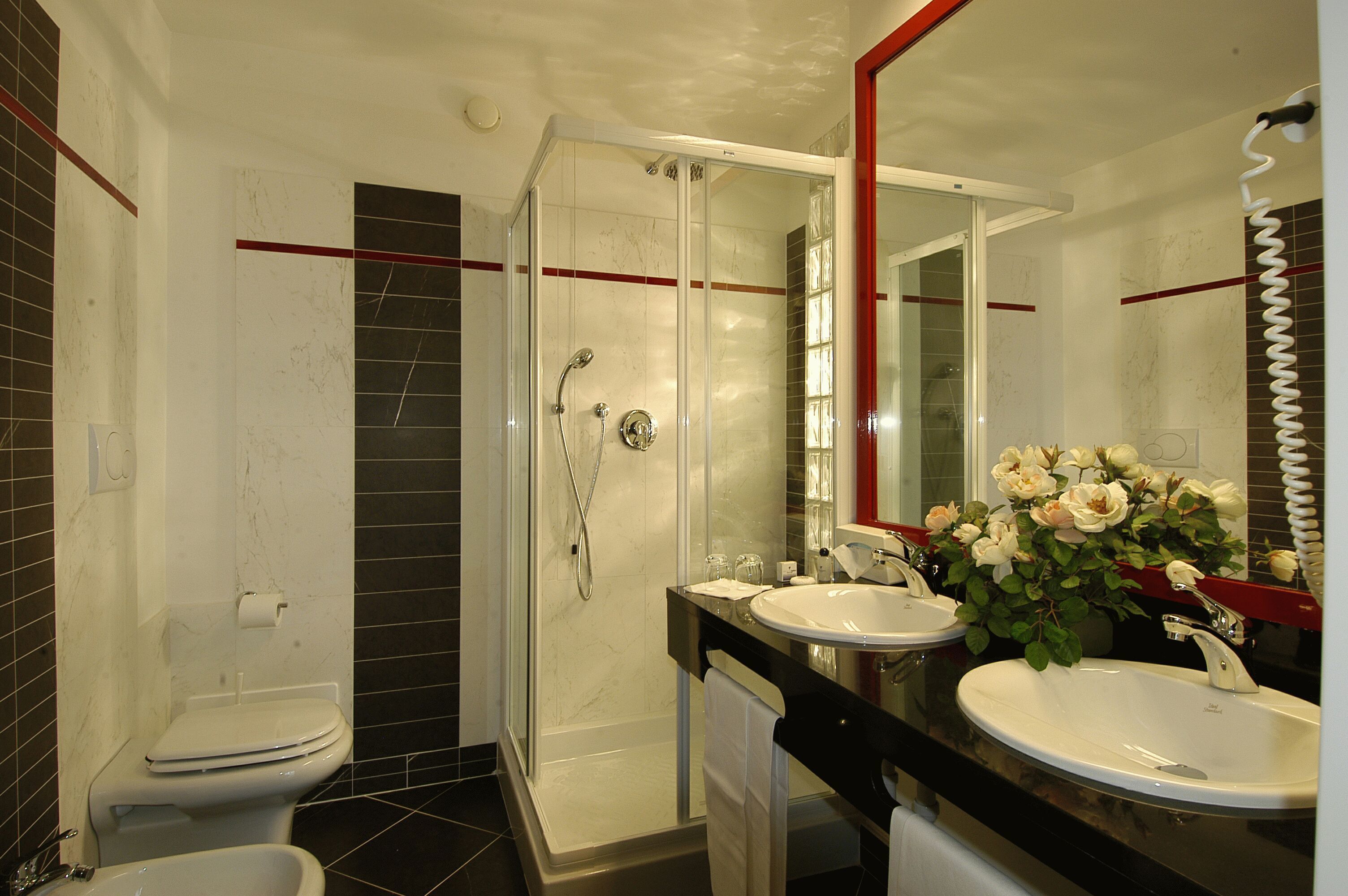 junior suite, balcony | bathroom | shower, eco-friendly toiletries, hair dryer, bathrobes