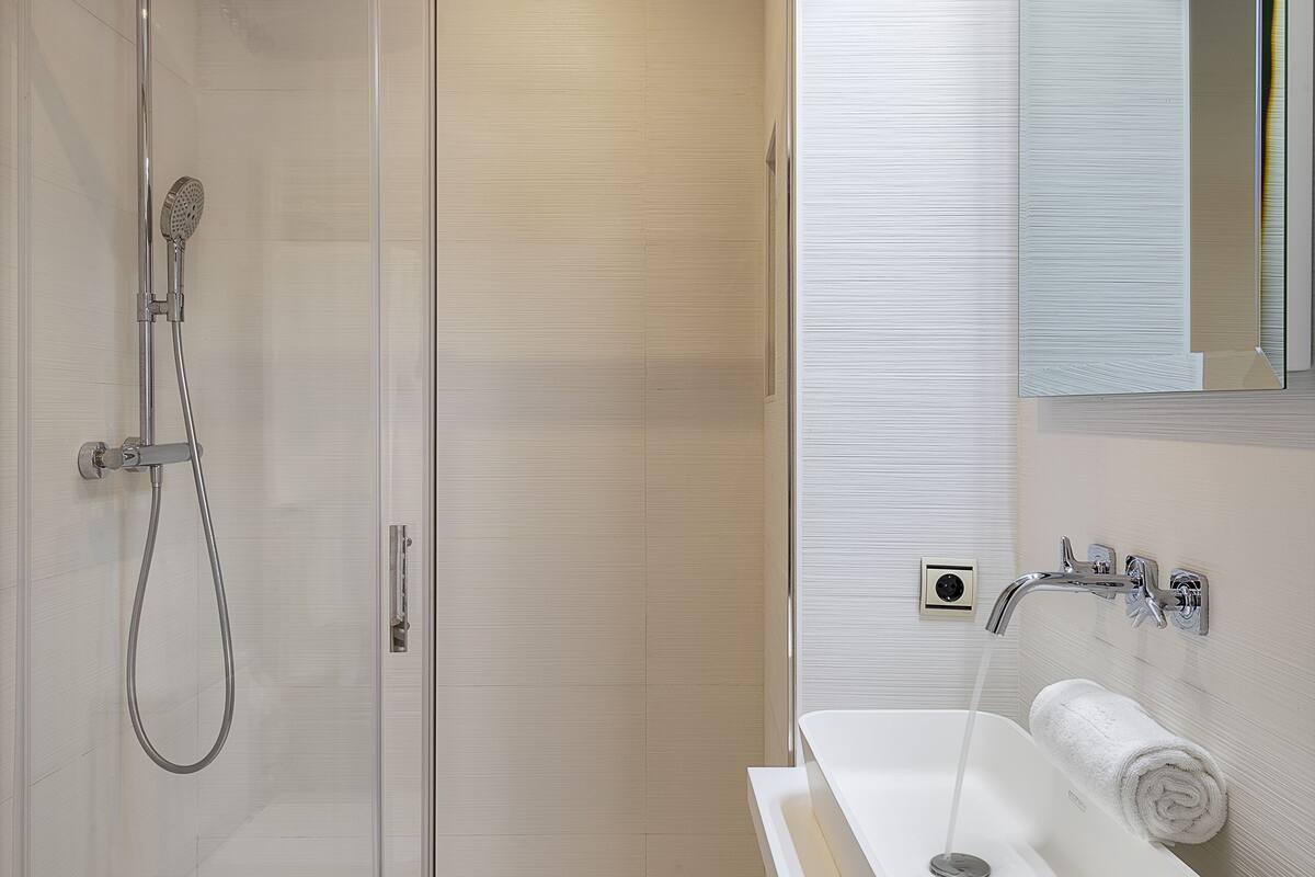 apartment     (outside the main building) | bathroom | rainfall showerhead, free toiletries, hair dryer, bathrobes