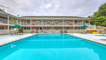 Seasonal outdoor pool, open 10:00 AM to 10:00 PM, sun loungers