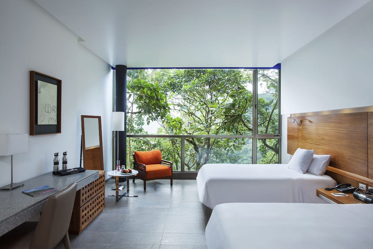 Premium bedding, down comforters, pillowtop beds, in-room safe