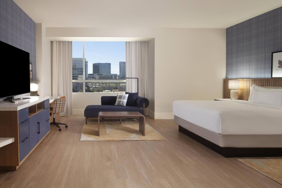 room, 1 king bed, accessible, non smoking (roll-in shower) | living area | 47-inch flat-screen tv with satellite channels, tv, pay films