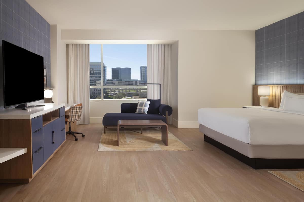 Room, 1 King Bed, Accessible, Non Smoking (Roll-in Shower) | Living area | 47-inch flat-screen TV with satellite channels, TV, pay movies